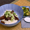 Buffalowurm Reis Bowl mit asiatischem Gurkensalat